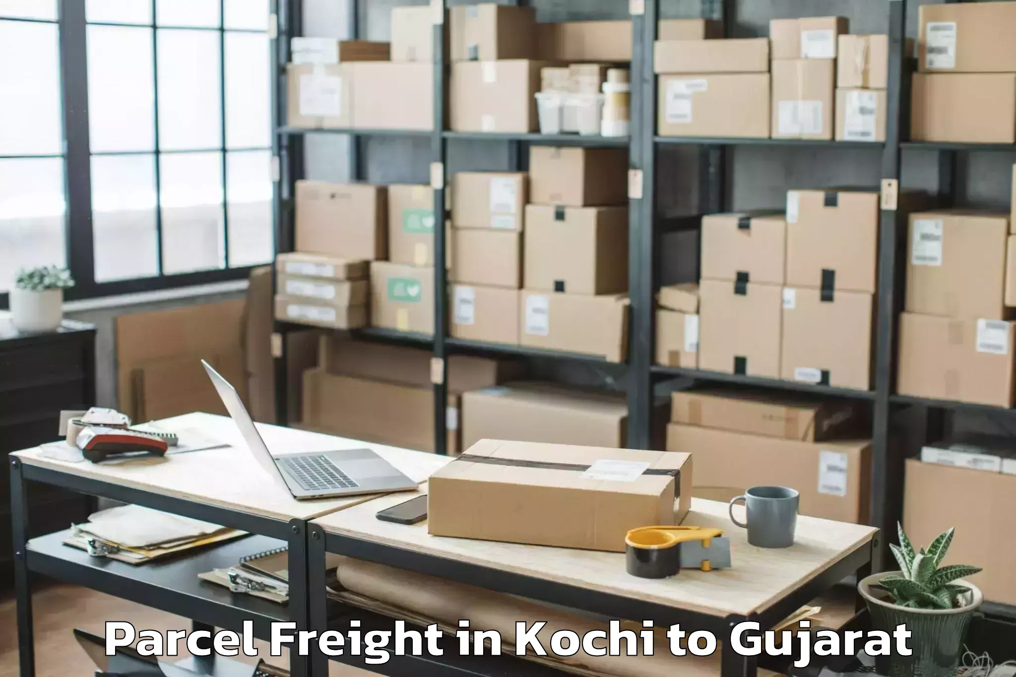 Book Your Kochi to Marwadi University Rajkot Parcel Freight Today